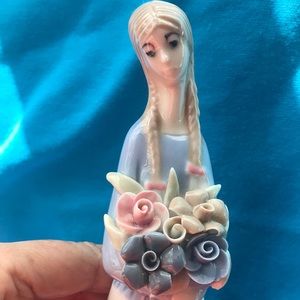 Beautiful tall young girl carrying precious flowers. Made in Spain. Vintage